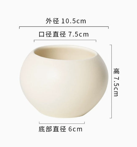 White ceramic fish bowl baby