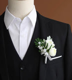 White boutonnière corsages for bride groom best men mother ranunculus head band